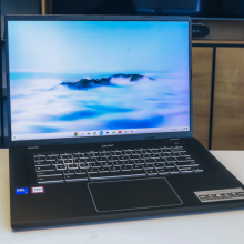 a 13-inch m2 apple macbook air against a cloud-patterned backdrop