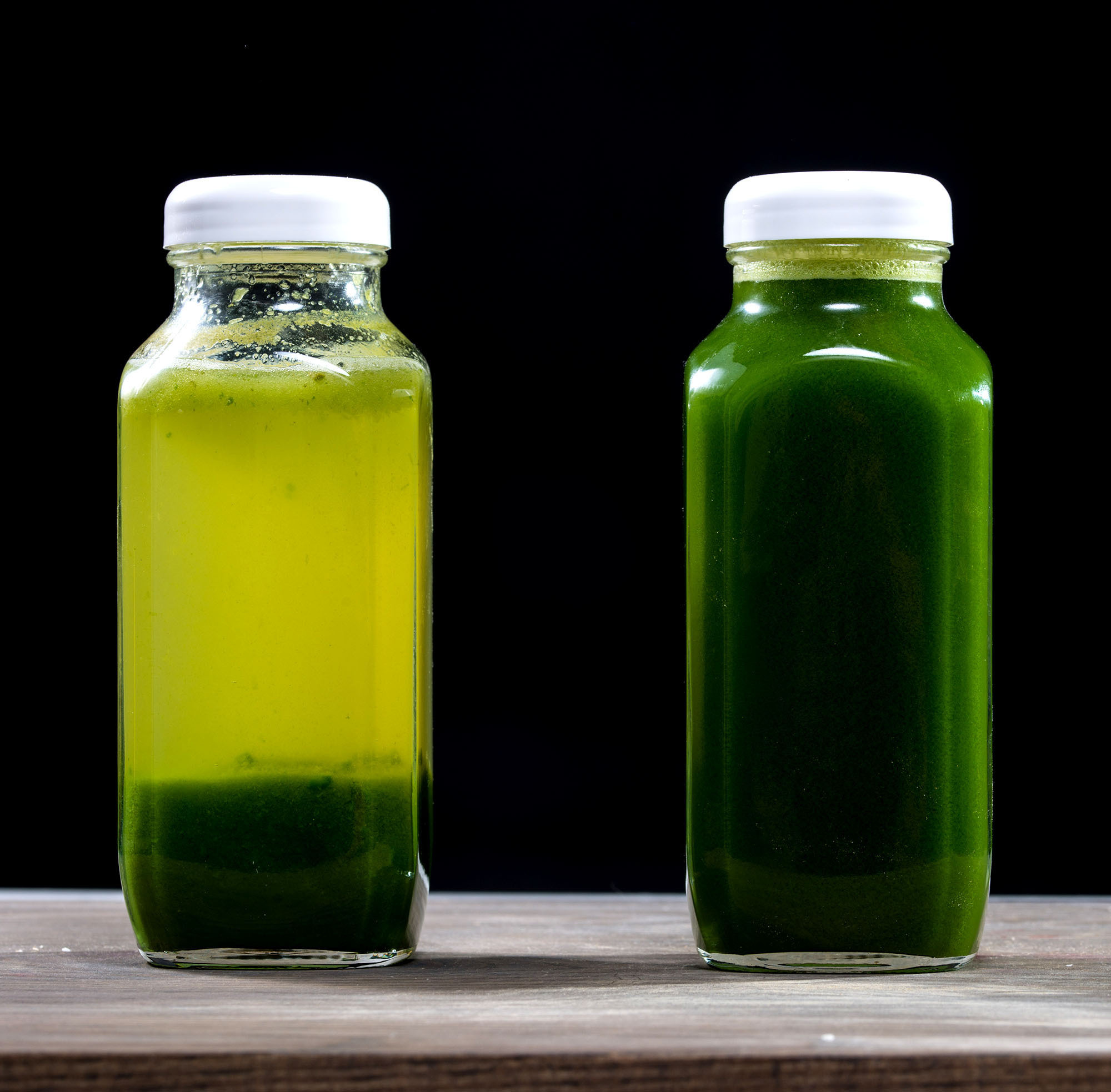 green juice in two bottles