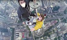 Daredevils scale Chinese skyscraper just for the selfie