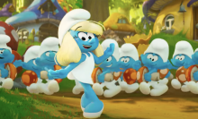 Smurfette dances among the Smurfs in the animated movie.