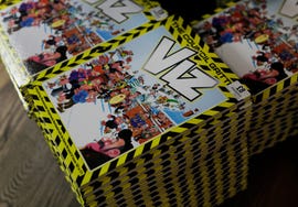 stack of comic books featuring colorful artwork and bold titles