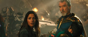 sarah shahi and pierce brosnan in black adam