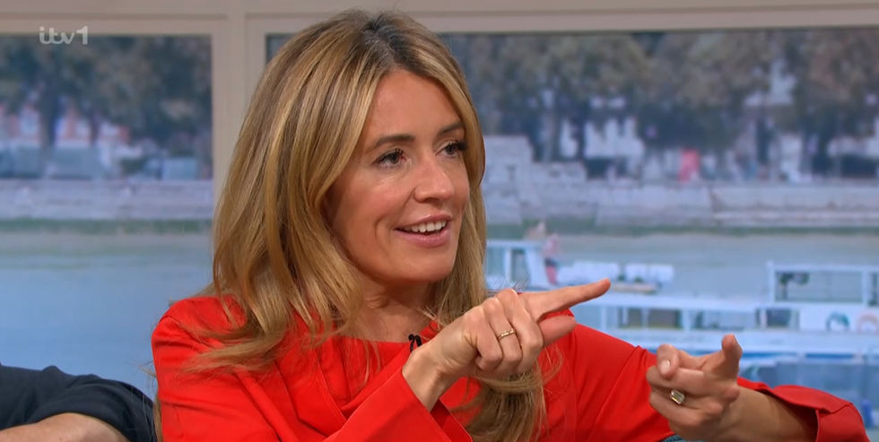 cat deeley presents this morning in a red blouse