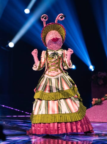 the masked singer 2025, snail stands on stage