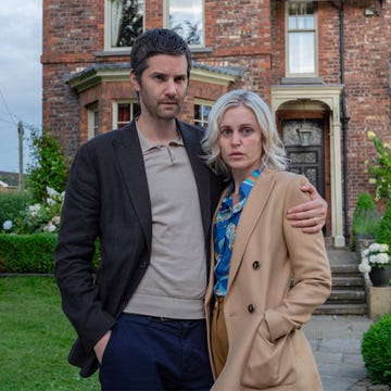 the stolen girl stars jim sturgess and denise gough posing outside a house