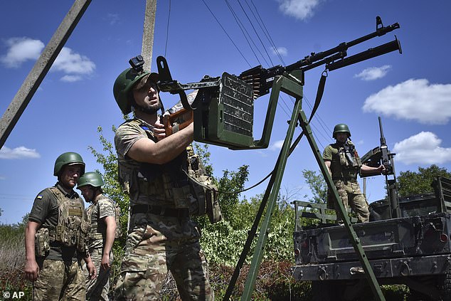 She accused the US of having a superhero complex by becoming embroiled in certain overseas conflicts such as Russia's invasion of Ukraine. Pictured: Ukrainian servicemen mobile air defense unit