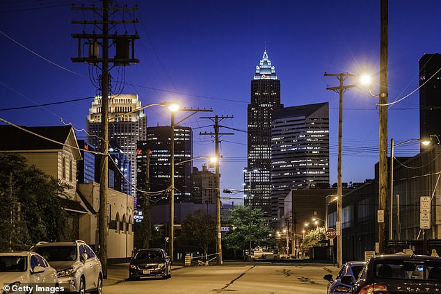Parts of East Cleveland are marred by crumbling properties, boarded windows, and broken glass