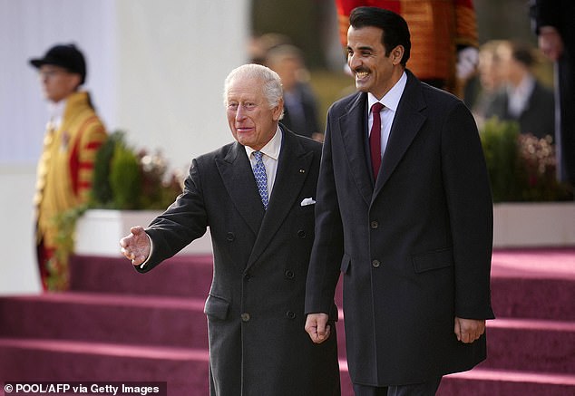 King Charles and Sheikh Tamim bin Hamad Al Thani were pictured while inspecting a Guard of Honour