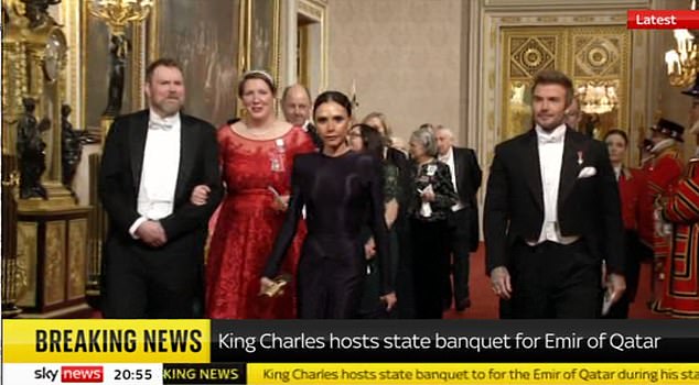 Proud David Beckham gave a reassuring hand to his wife Victoria as they joined the royals at King's glittering state banquet for Qatar on Tuesday night