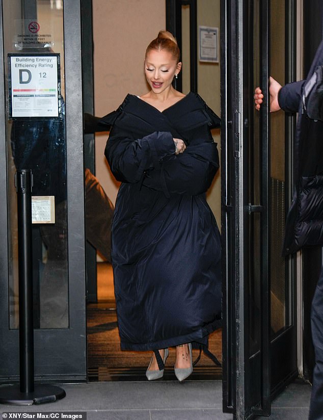 Ariana Grande bundled up to combat New York's freezing fall weather as she exited CBS Broadcast Center in Midtown Manhattan on Tuesday