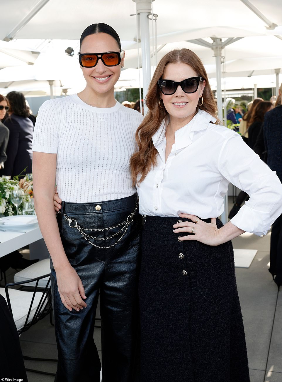 Amy also hid her face behind a pair of oversized sunglasses and posed with Gal, who also shielded her eyes behind a pair of orange tinted shades