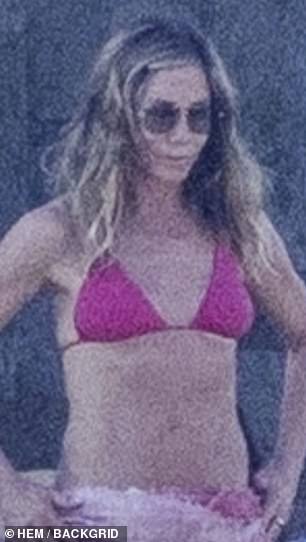 Jennifer Aniston, 55, brought something old into the New Year as she welcomed in 2025 with her A-list pals this week in Los Cabos, Mexico; Aniston seen Thursday