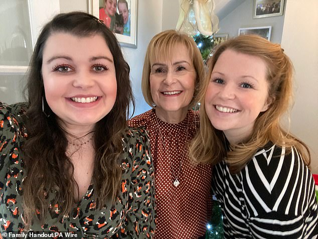 The possibility of a blood clot was noted at triage and positive results from a D-dimer - a test to identify clots - was recorded (pictured Ms Collins with her mother Irene and older sister Clare)