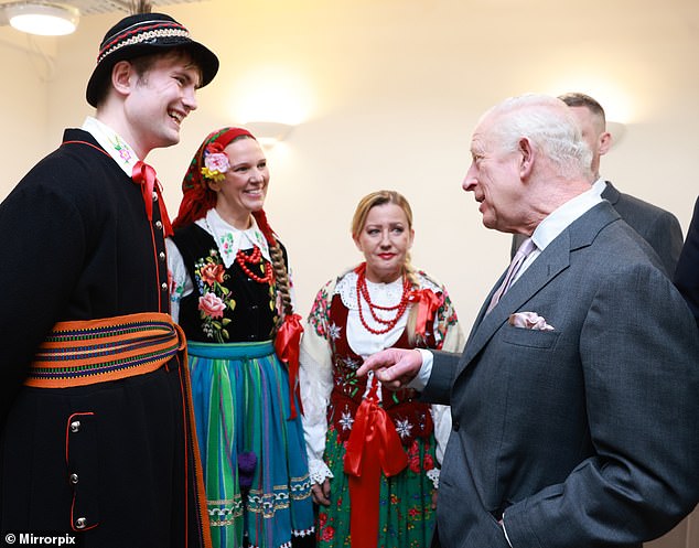 Members of the Polish Social and Cultural Association were all smiles as they met with Charles on Wednesday