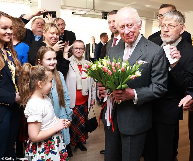 The 76-year-old monarch met members of the Polish community in Hammersmith, London, today