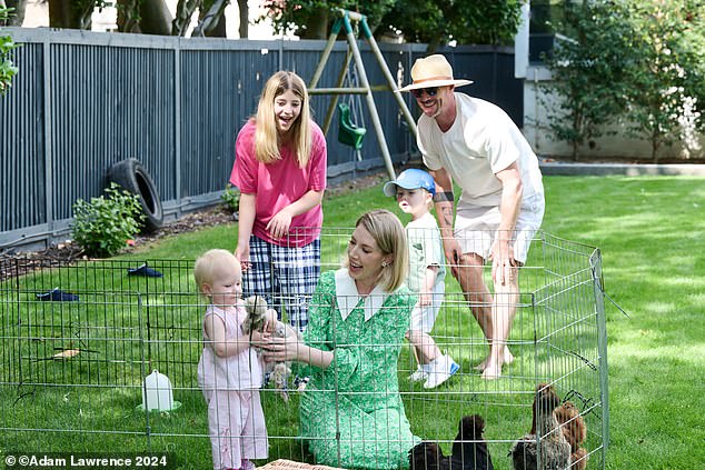 They now have two children together, Fred, three, and Fenna, two (pictured holding a chicken) as well as Katherine's daughter Violet, 14 (in pink T-shirt)