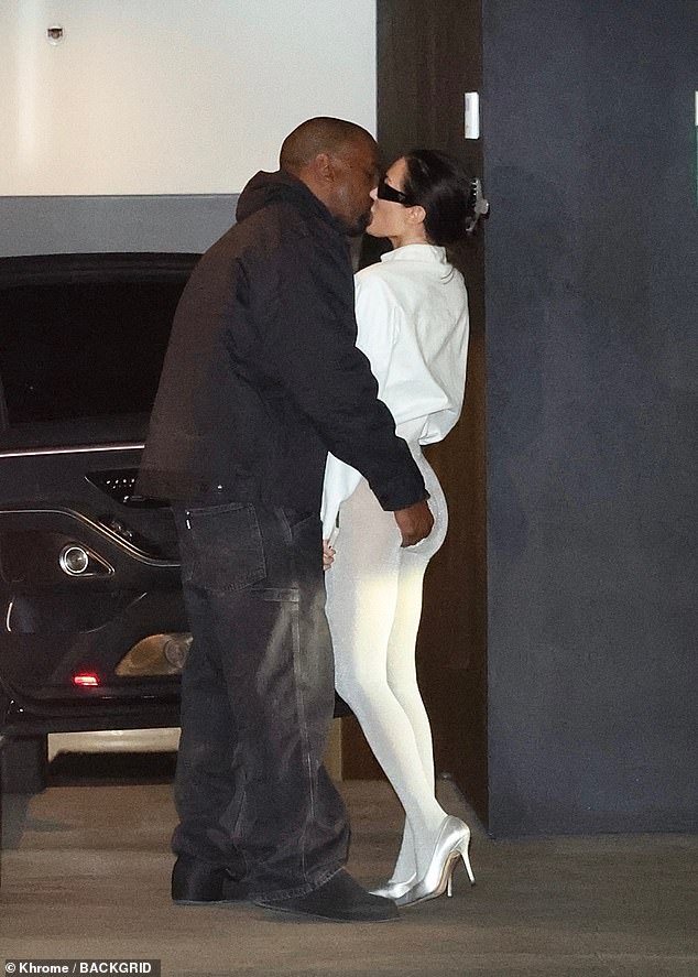 Kanye West was seen groping wife Bianca Censori as she flashed her derriere after her shocking naked Grammys stunt on Sunday