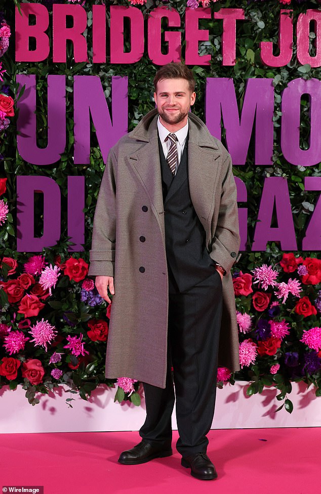 Leo, 28, showed off his own sense of style in a navy blue suit layered under a long grey coat, wrapping up for the chilly Rome weather