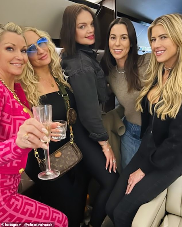 She and Christopher weren't the only travelers, and Christina was joined by several female friends who were also imbibing