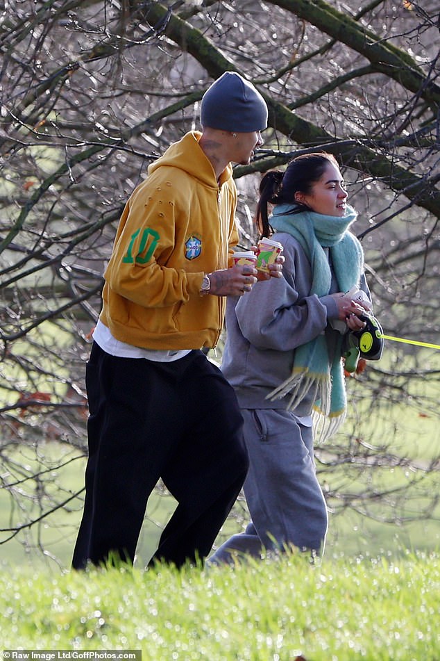 The loved-up pair held hands during the outing as they grabbed a coffee