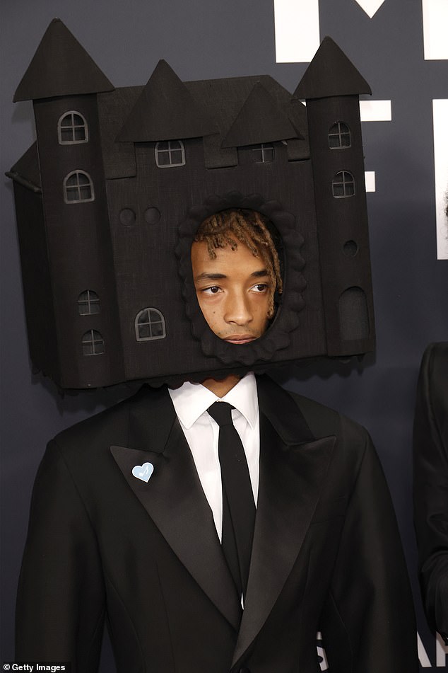 Jaden Smith, 26, was roasted by fans this weekend after he arrived at Sunday's Grammy Awards wearing an elaborate black hat shaped like a castle (pictured)