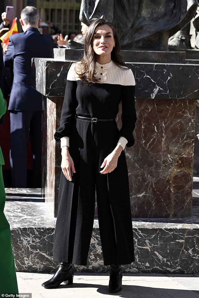 Queen Letizia of Spain looked typically chic in a monochrome ensemble as she stepped out on Thursday