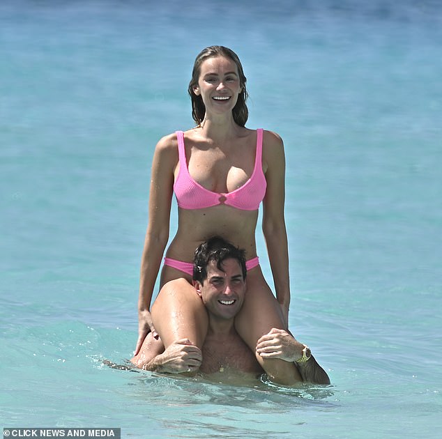 The couple, who've been dating for around nine months, looked happier than ever as they frolicked at the beach amid their stay at the luxury Sandy Lane hotel