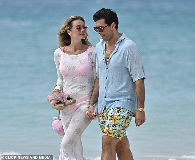 Nicoline later donned a white beach dress while James sported a pale blue shirt as they continued their day together