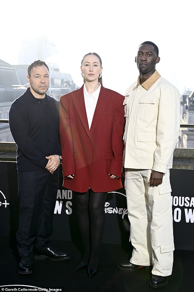 Stephen was joined at the photocall by actress and co-star Erin Doherty (centre) who opted for a burgundy oversized blazer and black leather trousers (pictured with Malachi Kirby)