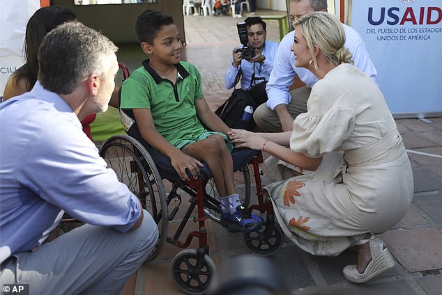 Ivanka Trump talks to Venezuelan migrant Andry Rodriguez at a migrant shelter in La Parada near Cucuta, Colombia when she traveled with USAID to the country in September 2019