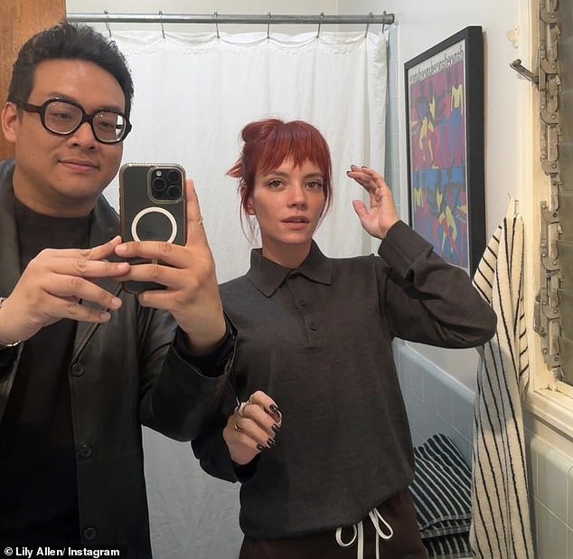 In another picture the star is captured alongside actor Daniel Nguyen as he takes a selfie in front of a large bathroom mirror