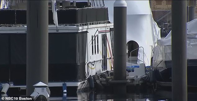 Residents in the Charlestown Marina where Donohue was found dead (his houseboat is pictured) said police swarmed the area on Sunday night, and described the victim as 'friendly' and 'well known' in the area