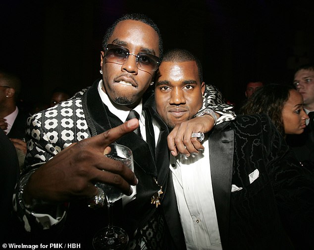 Diddy and Kanye West posted in NYC at Diddy's birthday bash at Cipriani's in 2004