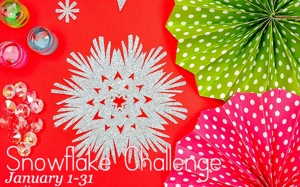 Snowflake Challenge promotional banner with image of white glittery craft snowflakes with glitter and gems and pink and green polka dot paper on a red background. Text: Snowflake Challenge January 1-31.