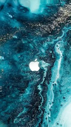 an apple logo is shown on the back of a blue marble wallpaper with black and white swirls