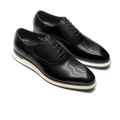 These executive-style slip-on dress shoes are crafted from cow leather with a pigskin lining, offering a blend of sophistication and ease for the modern professional. Black Wingtip Lace-up Shoes For Formal Occasions, Black Leather Oxfords With Contrast Sole, Business Almond Toe Slip-ons With Leather Lining, Black Leather Oxfords With Rubber Heel Cap, Black Leather Cap Toe Dress Shoes, Black Calf Leather Loafers With Contrast Sole, Luxury Slip-on Dress Shoes For Business Casual, Black Wingtip Oxfords For Business Casual, Black Leather Derby Shoes For Semi-formal Occasions