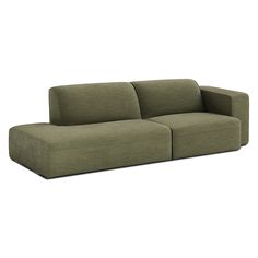 a green couch sitting on top of a white floor