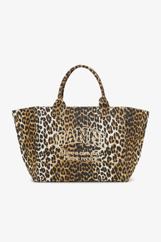 Leopard print oversize tote bag Ganni Leopard, Printed Canvas Tote Bag, Brown Tote Bag, Brown Tote, Shopper Bag, 7 And 7, Wash Bags, Canvas Tote Bag, Embroidery Logo