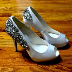 Pair Of Ivory Satin Peep Toe Pumps With Rhinestone, Pearl, And Silver Beading Details By Paradox London Pink. 5 Inch Heel With 1 Inch Platform Under Toe. Brand New, Never Worn, And Still In Original Box. Great For Brides And Weddings! Fitted Silver Embellished Heels, Silver Open Toe Fitted Wedding Shoes, Silver Embellished Heels, Fitted Silver Open Toe Wedding Shoes, Fitted Silver Wedding Shoes With 4-inch Heel, Silver Round Toe Wedding Shoes With Rhinestones, Silver Rhinestone Wedding Shoes With Round Toe, Silver Wedding Shoes With Rhinestones And Round Toe, Silver Embellished Open Toe Wedding Shoes