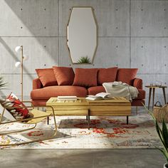 a living room scene with focus on the couch and coffee table in the foreground