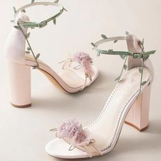 Blush block heels with pastel organza flowers and twirling embroidered vine ankle straps. The perfect flower heels for any garden soiree. New Heels Design 2023, High Heels Flowers, Whimsical Wedding Heels, Weeding Shoes For Girl, Quinceanera Shoes Light Green, Princess Core Shoes, Marie Antoinette Heels, Fun Prom Shoes, Cottage Core Wedding Shoes