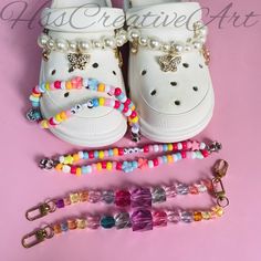 2pcs Colorful shoe Chains -Color: as shown -Include: 2pcs shoe Chains -Use: could be used for croc shoe decoration -Style: as shown these are very nice shoe charms all products will shipped from Hong kong. For most countries, it will take 20 days to arrive. Have a nice day! Cheap White Fun Shoe Charms, Diy Shoe Chain, Shoe Accessories Diy, Shoe Chains, Colorful Shoe, Croc Shoe Charms, Shoe Decoration, Diy Clothes And Shoes, Kandi Bracelets