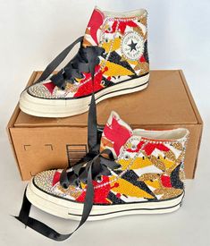 Converse Chuck Taylor All-Star 70 High-Top Shoes Red/Yellow/Black Custom Bedazzled Beaded Women's 8½   Rare Customized Converse Chuck Taylor All Star Sneakers Covered in Red, Black, Gold, and Yellow Beads and silver spike-like beads. Shoes come laced with black ribbon ties, and additional red ribbons and yellow ribbons! Size: US Women’s 8½ (Bottom of sole measures approximately 10¾ inches heel to toe.) Comes in an Amazon Prime box. Please look at photos for more description. Smoke-free. Free Shipping in the Lower 48 USA states only. Item(s) will be shipped FREE to those in the lower 48 states via USPS, UPS or FedEx (depending on location and package weight/size). Orders to ALASKA (AK), HAWAII (HI), or PUERTO RICO (PR) may cost extra for shipping. Please contact us prior to purchase for shi Beaded Sneakers, Customized Converse, All Star Sneakers, Usa States, Yellow Ribbon, Shoes Custom, Star Sneakers, 4 Inch Heels, Converse Chuck Taylor All Star