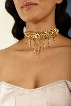 A Unique Vintage Filigree Choker perfectly suited for special occasions and someone that loves statement jewelry. The antique gold finish makes it a bold yet elegant necklace option. It's easy to style with traditional Indian or Pakistani suits, fusion outfits or even with a black dress. The choker necklace is versatile and easy to style. Wear it solo or pair it with matching lotus studs as a set. To complete the look and make it a set by adding a matching earrings, handpiece and bracelet from t Luxury Bollywood Style Necklaces As Gift, Luxury Ornate Jewelry For Diwali, Luxury Yellow Gold Choker For Formal Occasions, Luxury Elegant Necklaces For Diwali, Brass Jewelry With Intricate Design For Parties, Party Jewelry With Intricate Brass Design, Gold-tone Metal Necklaces For Wedding, Elegant Antique Gold Necklaces For Festive Occasions, Ornate Brass Necklaces For Wedding