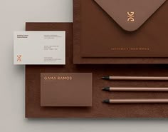 the stationery is laid out neatly and ready to be used as business cards or envelopes