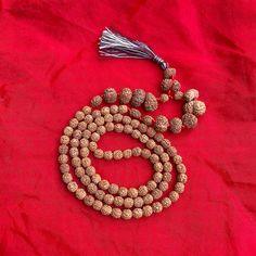 "Dimension:- Weight         : 43 Grams  Length          : 20.5\" Inches  Bead Size     : 7-20 MM (Small to big) No. of Beads : 107 Beads Shape            : Oval & Round Faces             : 1-14 Face, Ganesh, Gauri Shankar  Color              : Brown  Uses               : Meditation, Prayer  Certified by  : Rudraksha & Gems Testing Lab This is a divine Rudraksha Siddha Mala. Lab Certified 107 bead Rudraksha Siddha Mala Consist of 1 to 14 Mukhi, Gaurishankar, Ganesha Beads Rudraksha Mala.  Other items from our shop you may like it:- https://naturalcrystalshub.etsy.com/listing/1071204570 https://naturalcrystalshub.etsy.com/listing/1085151419 PACKAGING DETAILS:- We Wrap the product with multiple layers of bubble wrap and secure it with tape. We place the wrapped product in a suitable wooden or Traditional Necklaces With 8mm Beads For Rituals, Traditional Jewelry For Meditation With 8mm Beads, Traditional Jewelry With 8mm Beads For Meditation, Traditional 8mm Beads Jewelry For Meditation, Handmade Spiritual Mala For Rituals, Bohemian Mala For Rituals And Festivals, Bohemian Mala For Festivals And Rituals, Spiritual Beaded Necklaces For Festive Occasions, Festive Temple Jewelry For Meditation