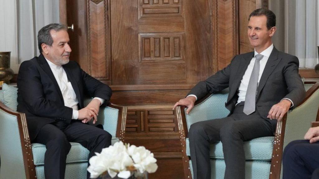 Bashar al-Assad (R) meets Iranian Foreign Minister Abbas Araqchi in Damascus, Syria (1 December 2024)