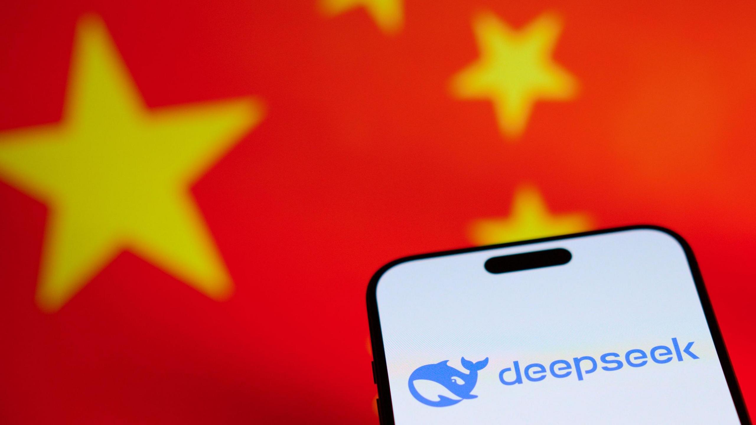 A photo of the DeepSeek app, with the Chinese flag in the background