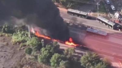 Vehicles in flames on Brazil highway