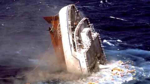 The Oceanos sinking off the coast of South Africa, August 1991